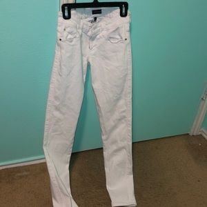Woman’s size 24 white skinny jeans